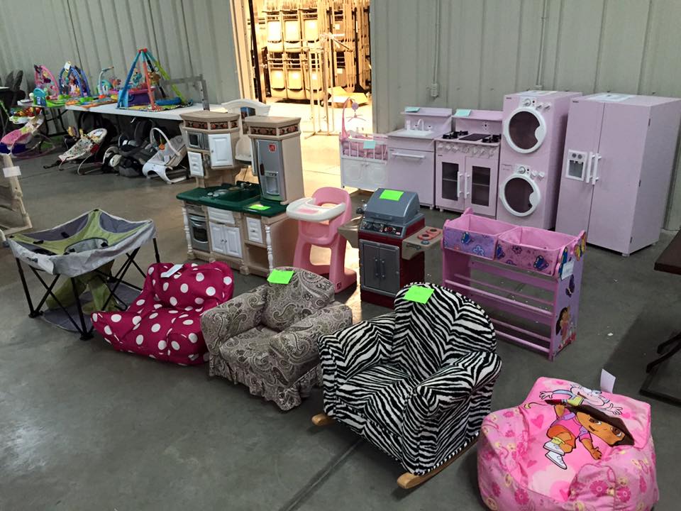 Assortment of colorful childrens chairs, pink toy washer and dryer, dishwasher,refridgerator,baby seats